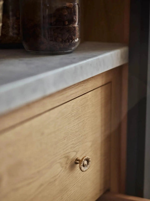 Six Pack Antique Brass Cabinet Knobs With Vintage Floral Drawer Pulls And Sunburst Design for kitchen cabinets close-up