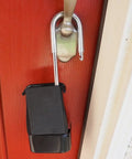 Combo Realtor Lockbox 12 Pack With Easy 4 Digit Code Reset mounted on red door showing robust metal hook and secure high capacity tray