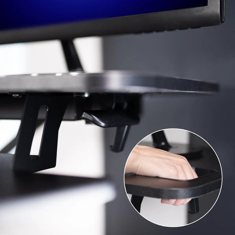 Close-up of adjustment lever on Extra Wide 38 Inch Corner Desk Converter With Height Adjustable Sit To Stand Riser
