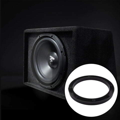 Get Your Sweet Ride Hooked Up With Premium 6.5 Inch Car Speaker Spacer Rings And Mounting Brackets 4 Pack In Sleek Black displayed with a subwoofer.