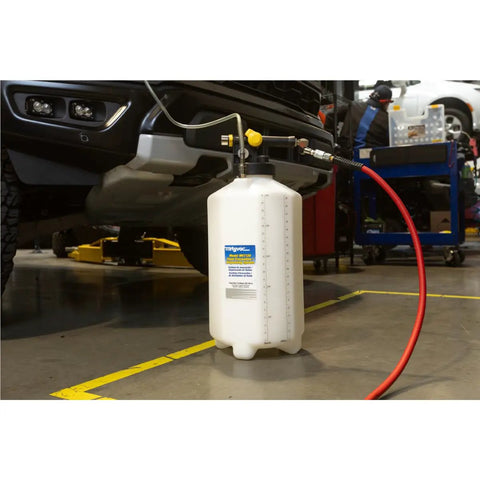 Fluid Extractor Dispenser For Evacuating And Refilling Reservoirs, Topping Off And Bleeding Hydraulic Brake And Clutch Systems, 5.3 Gallon Capacity, 120 PSI, Vacuum Or Positive Pressure, Compressed Air Ready, Pro Grade Heavy Duty shown in a garage setting.