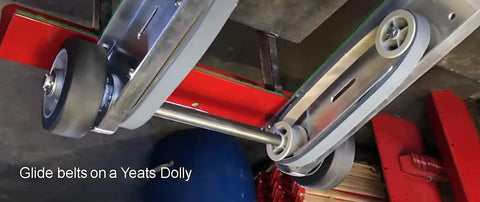 Close-up of sturdy 71 Inch Aluminum Appliance Dolly with glide belts and rubber wheels for moving heavy washers.
