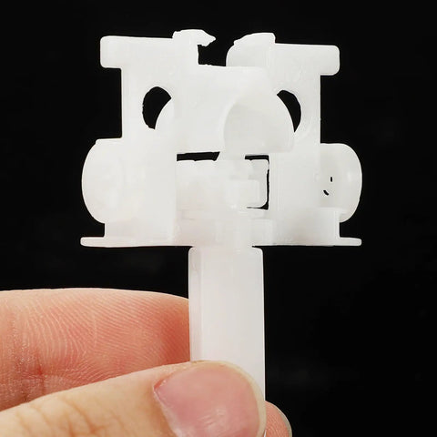 Top Shelf Vertical Blind Carrier Replacement Parts With Stem Upgrades close-up of white plastic carrier part for window treatment.
