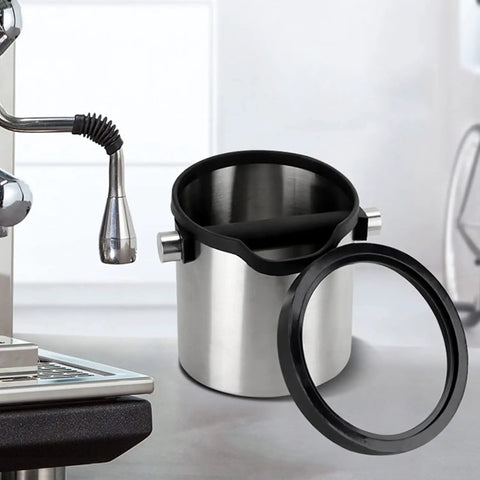 Pro Made Stainless Steel Coffee Knock Box And Espresso Tamping Station with shock dampening grip and easy lift tray on kitchen countertop.