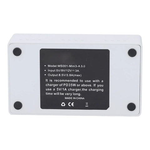 Label details on the bottom side of the Three Bay Drone Battery Charger Hub With Fast 35W Dual Charging designed for Mini 3, 4, and Pro.