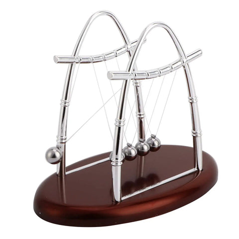Newton Cradle Desk Toy With Classic Pendulums And Gentle Clinking A Cool Educational Physics Demonstration featuring silver base and balls