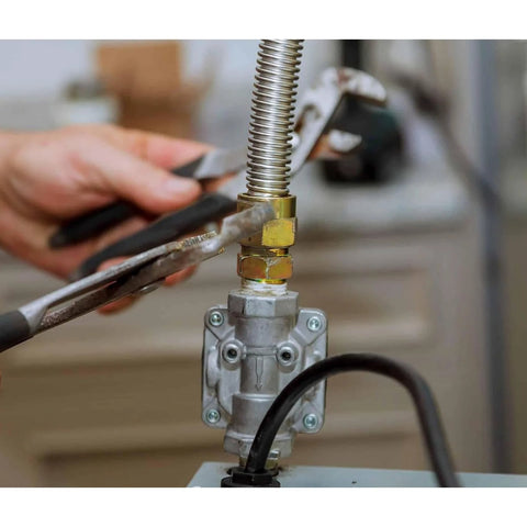 Installation of heavy-duty gas regulator propane natural gas with tools in use