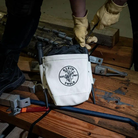 Person using Top Closing Bolt Bag With 3 Inch Drawstring, Load Rated Tool Bag For 5 X 10 X 9 Inches, Built Tough No 4 Canvas