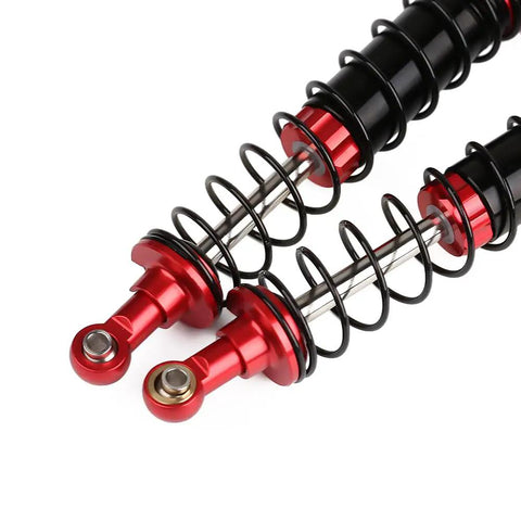 Close-up of two red and black metal shock absorbers from 4 Piece RC Shock Absorber Set For 1 To 10 Scale RC Crawlers Like Axial SCX10 90046 AXI231017 And TRX 4 D90 120mm Dampers With Spare Springs And Screws Oil Not Included Metal Construction For Beefy Rugged Damping