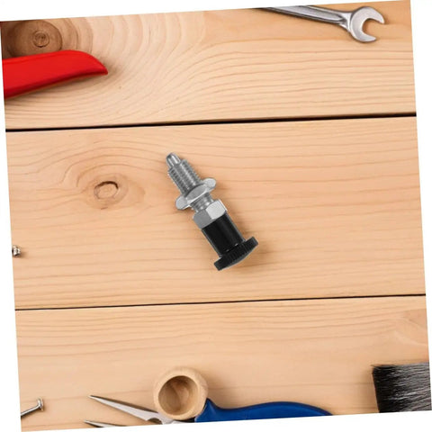 Built Damn Tough Stainless Steel Self Locking Indexing Plunger With Slick Spring Return Knob on wooden workbench.