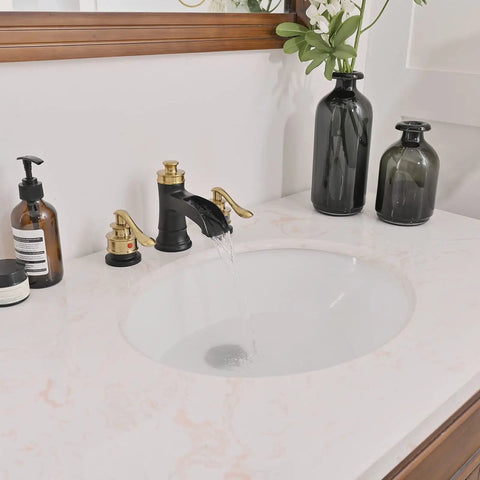 Black and gold widespread 8 inch bathroom faucet with water flowing, 3 hole sink mixer, brass pop up drain stopper, and supply lines visible