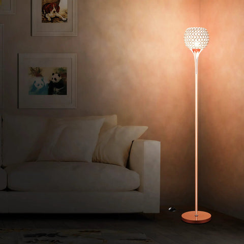 Crystal Floor Lamp In Rose Gold With Remote Control, Modern Standing Light For Living Room, next to beige sofa.