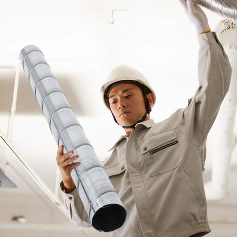 Worker installing Two Pack 4 Inch Round Spiral Air Ducts, 45 Inch Long Threaded Metal Ducts, Galvanized Steel Dryer Vent Hose