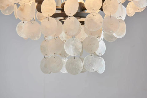 Close-up of Capiz Shell Semi Flush Mount Ceiling Light in Matte Black for Bedroom and Kitchen, showcasing shimmering capiz shells.