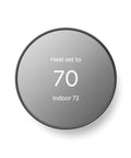 Nest Thermostat Smart Programmable WiFi Thermostat With Energy Star Certification For Easy Home Automation Real Savings On Bills And Simple Scheduling In Charcoal Finish, digital display showing temperature.