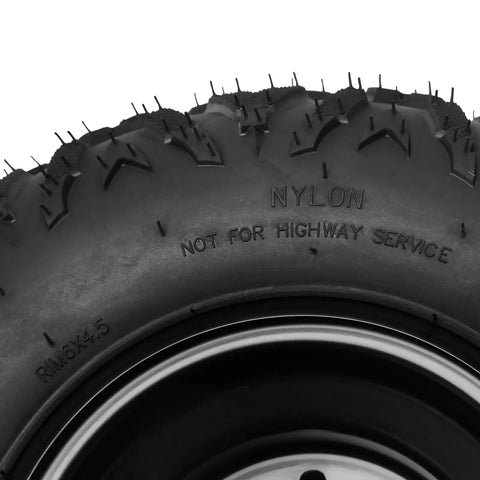 Close-up of Mud Grinder 2PC 145X70-6 ATV tire showcasing tread design and nylon construction for off-road use.