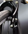 Close-up of Dope Front And Rear V Brake Set For Mountain Bikes With Cantilever Design Black 55 Millimeter Long Pads