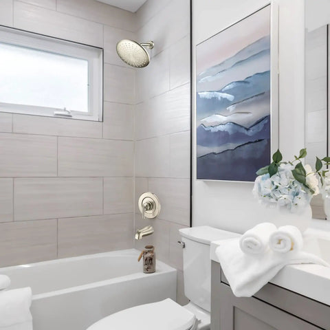 Modern bathroom with Slip Fit Tub Spout With Pull Up Diverter For Half Inch Copper Tubing In Brushed Nickel Finish on bathtub.
