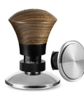 58.35mm Espresso Tamper with Spring Loaded Return and Adjustable Depth, wooden handle, stainless steel ripple base, side view.