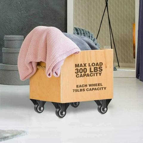 Heavy Duty 12 Pack 1.5 Inch Fixed Caster Wheels For Moving Big Couches And Workbenches Each Polyurethane Roller Handles 75 Pounds And glides on a wooden storage box holding blankets.
