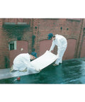 Workers applying Peel and Seal Self Stick Roll Roofing Aluminum 36 Inch Wide Durable Self Adhesive Roofing Material on rooftop