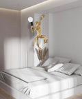 Modern Resin Monkey Wall Lamp with Hemp Rope Accent in a bedroom, adding playful charm and subtle illumination to white decor.