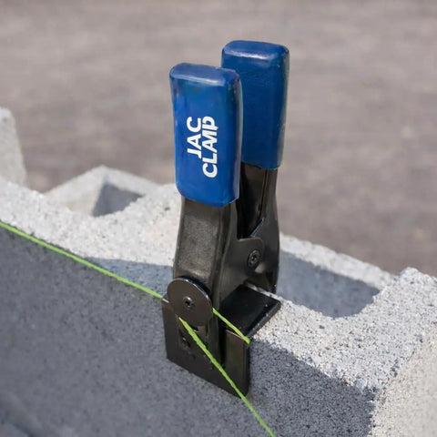 Heavy Duty Mason Line Clamps Pair for brick, block, and fence with no slip grip securing mason string on cinder block