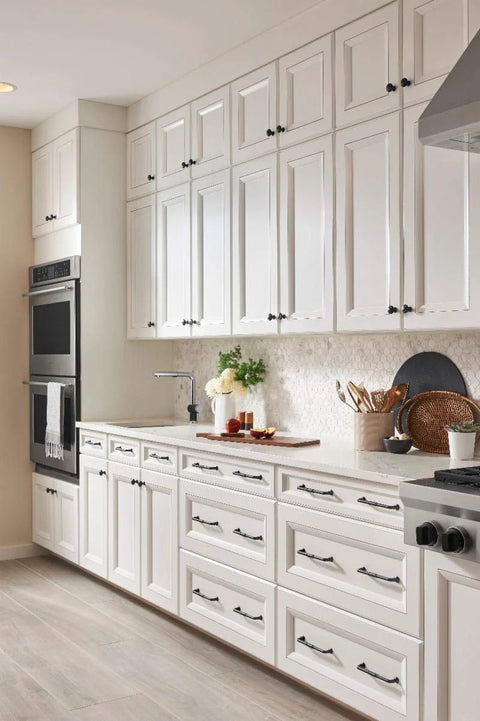 Riverside Pull Grace Collection Honey Bronze 8 13/16 Inch Contemporary Transitional Bar Handle in a modern kitchen setting