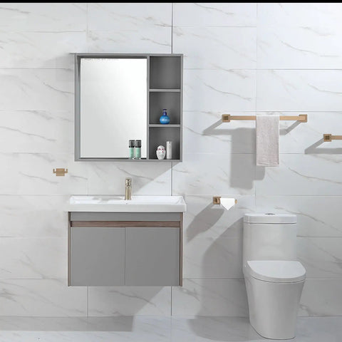 Slick Black And Brushed Gold 5 Piece Bathroom Hardware Set with installed 23.6 inch towel bar in modern bathroom design