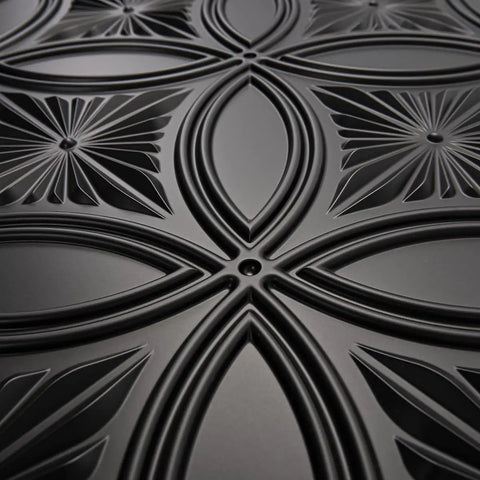 Close-up of ornate Black PVC Drop Ceiling Tile 2x2 Ft With Glue Up 3D Wall Panel Look, 24x24 In, 12 Pack, showcasing 3D pattern detail.