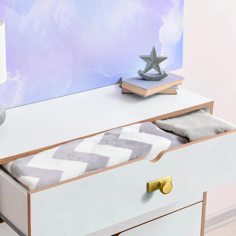 Open drawer with Brushed Gold Cabinet Knob With Backplate, displaying folded fabric, part of Zinc Alloy Kitchen Hardware set