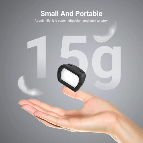 Hand holding Magnetic LED Fill Light For DJI Osmo Pocket 3 Gimbal, Compact 1.3W Rechargeable Mini Light, highlighting portability