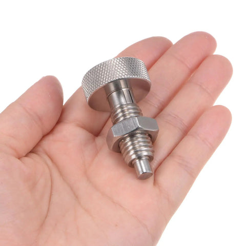 Four Pack Stainless Steel Spring Plunger Pins M12x1.75 Retractable Locating Pin in hand for heavy duty tooling.