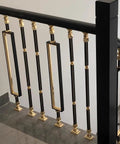 Built Heavy Adjustable Black Aluminum Stair Railing Spindles And Deck Balusters With No Stress Ground Mount For Pet Baby Safety Fence Posts And Durable Staircase Rails, featuring elegant gold accents.