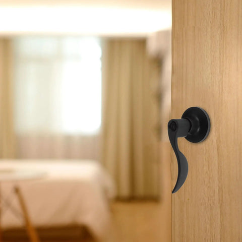 Quiet Operation Matte Black Door Lever Handle With Silent Technology And Wave Style Privacy Lock in bedroom setting