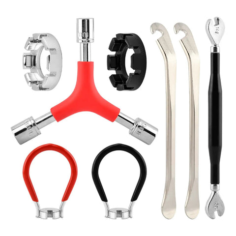 No Sweat Road Warrior Bike Repair Kit featuring five universal spoke wrenches, two tire levers, and one Y-shaped socket adapter.