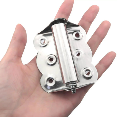 Person holding Auto Reset Spring Butterfly Hinges, Stainless Steel, 2.7x2.4 Inch, Flat Sand Finish, rustproof and durable.