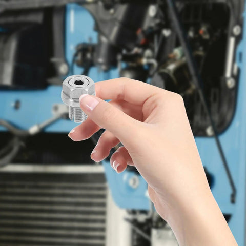 Stainless Steel Oil Drain Plug Bolt With Rubber Washer For Car Engine, Sturdy Self Tapping Thread Repair Kit To Fix Leaks And Ensure Perfect Seal. Held in hand