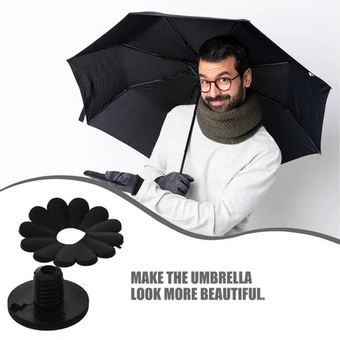 Deck Out Your Patio Setup With Slick Patio Umbrella Tip Caps And Canopy Protectors As Tough Replacement Parts For A Quick Repair Job And Scratch Shielding Using Heavy Duty Rubber Cushion Inserts To Keep Your Garden Gear Looking Fine All Season Long. Man holding a black umbrella with rubber tip caps.