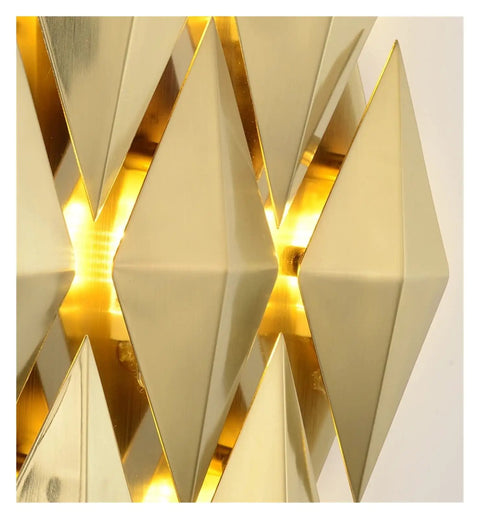 Close-up of a Modern Nordic Wall Sconce with glare-free LED accent lighting, sleek golden triangular design, 28 cm.