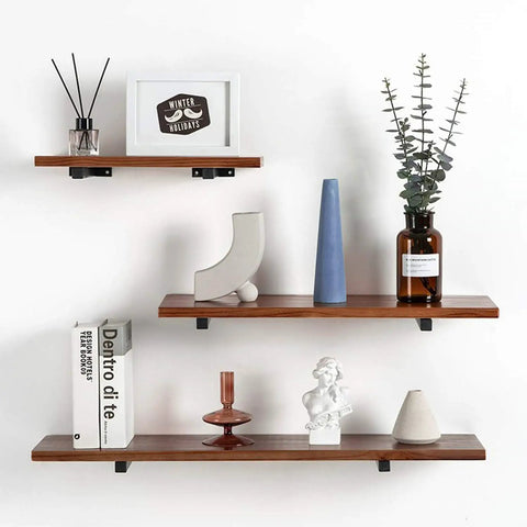Beefy Four Pack Heavy Duty Floating Shelf Brackets 8 Inch Wall Mounted Industrial Steel Brackets with decor items on shelves