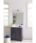 Three Light Coastal Vanity Light With Clear Glass Shades In Polished Nickel Finish for modern beachy bathroom setup above sink