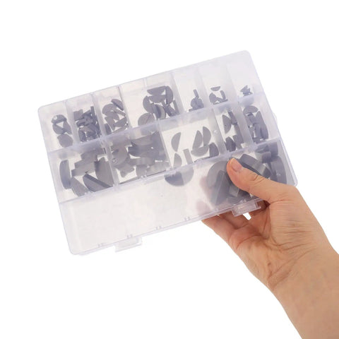 Hand holding Super Tough 164 Piece Woodruff Key Kit Made From Tough Carbon Steel Semicircle Keys in storage box