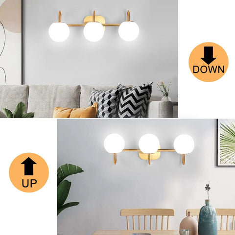 Two views of Three Light Vanity Light Fixture For Bathroom With Brushed Brass Frame And Milk White Glass Globes, mounted up and down