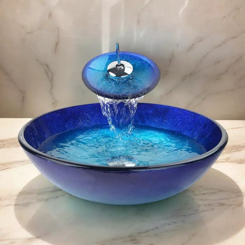 Slick Blue Countertop Bathroom Vessel Sink With Waterfall Faucet Round Glass Vessel Sink Combo Above Counter Design Modern Tempered Glass Bowl For Stylish Home Upgrades in marble setting