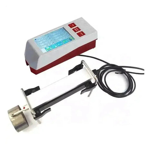 Rock Solid Portable Surface Roughness Tester And Split Type Digital Meter For Instant Metal And Plastic Parts Measurement With Ergonomic Handheld Design Allowing Construction Crews To Knock Out Quality Checks Without Breaking A Sweat, showing digital screen and probe.