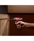 12 Volt Cordless Hex Screwdriver Kit With Two 1.5Ah Batteries, Charger, And Tool Bag, variable speed trigger in use on cabinet