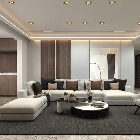 Badass 3 Inch Brass Recessed Downlights Featuring Sleek Baffle Trim And Solid Copper Build For Dead On Precision These 7 Watt 4000K fixtures illuminating a modern living room.