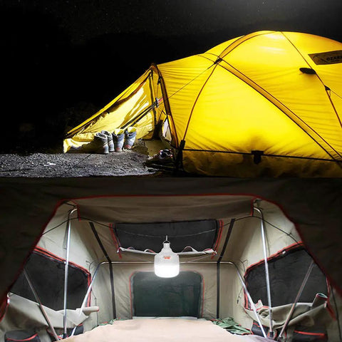 Yellow tent illuminated by Newest 30W 5500LM Waterproof Rechargeable LED Night Light Bulb inside, for camping use and power backup.