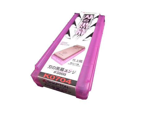 Pink box holding a Dual Grit Ceramic Whetstone Set 5000 And 12000 For Sharpening Kitchen Knives Sushi Knives And Precision Tools.